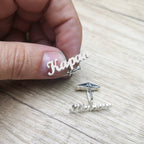 engraved silver cufflinks close up
groom personalized cuff links
men’s custom silver cufflinks
luxury name engraved cufflinks
handmade silver name cufflinks
wedding cufflinks for groom
custom cuff links with name
silver initial cufflinks for men
formal men’s silver cufflinks
personalized groom accessories
anniversary gift silver cufflinks